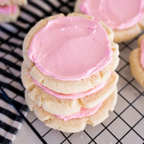crumbl sugar cookies, stacked in a stack