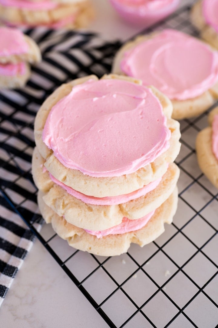 crumbl sugar cookies, stacked in a stack