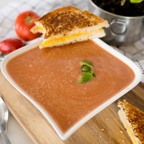 tomato basil soup with a grilled cheese sandwich