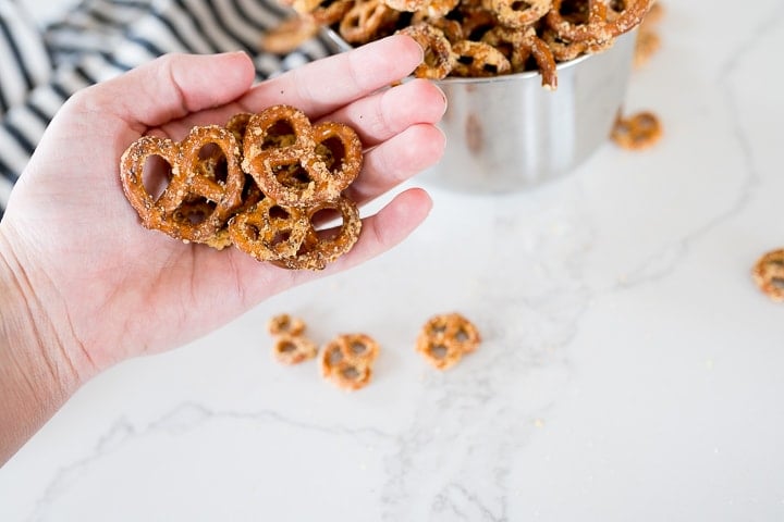 Dot's pretzels copy cat recipe being held in a hand