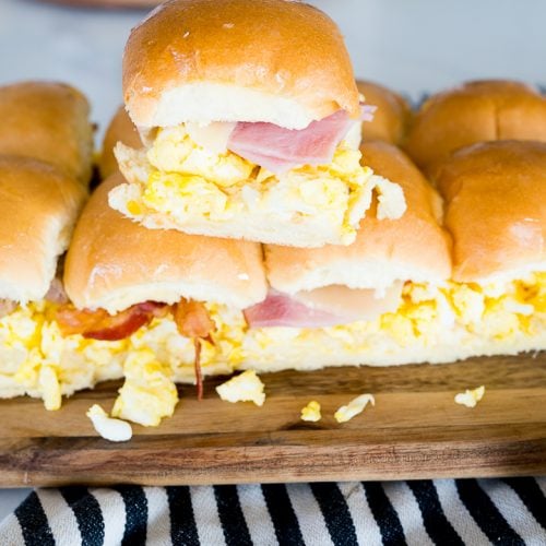 breakfast slider sandwiches with scrambled eggs, cheese and meat