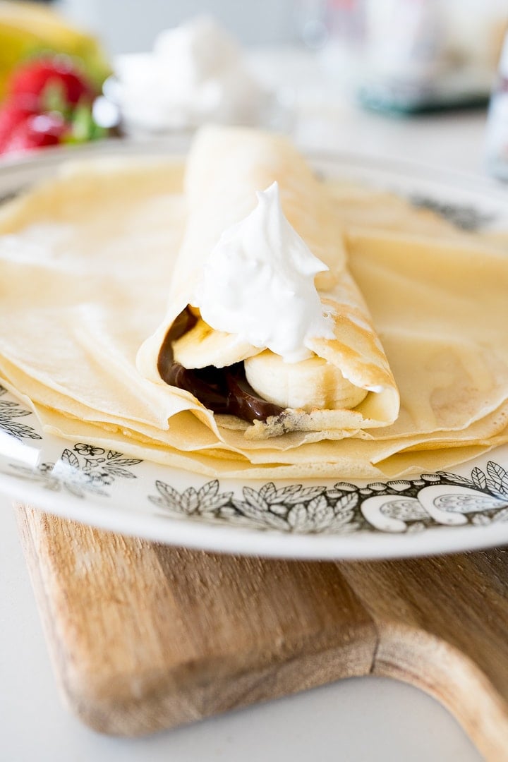 crepe rolled up with chocolate and banana inside
