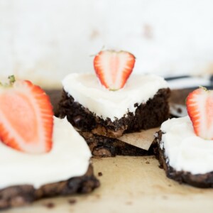 brownies with cheesecake frosting and strawberries