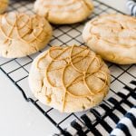 Crumbl Ultimate Peanut Butter Cookies on a cooling rack