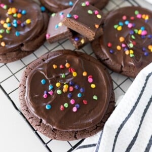 cosmic brownie cookies on a black cookie cooling rack