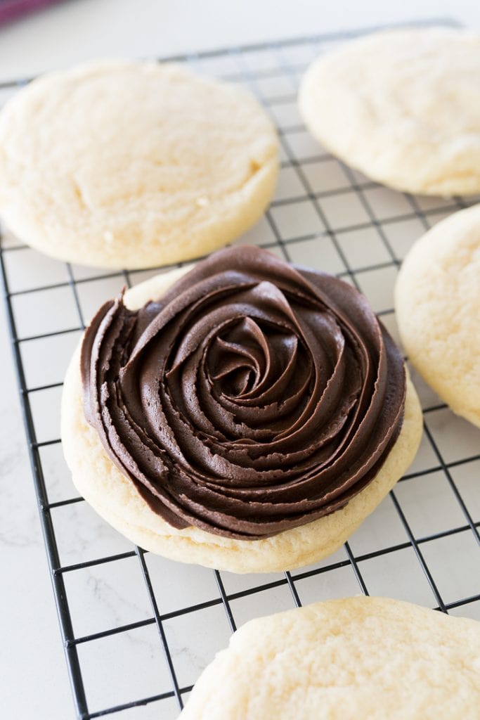 One cookie frosted with chocolate fudge frosting. 