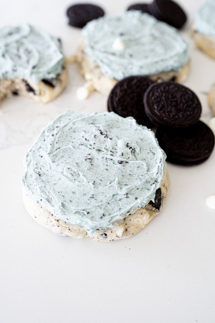 oreo mint cookie from crumbl on the counter with oreos next to it