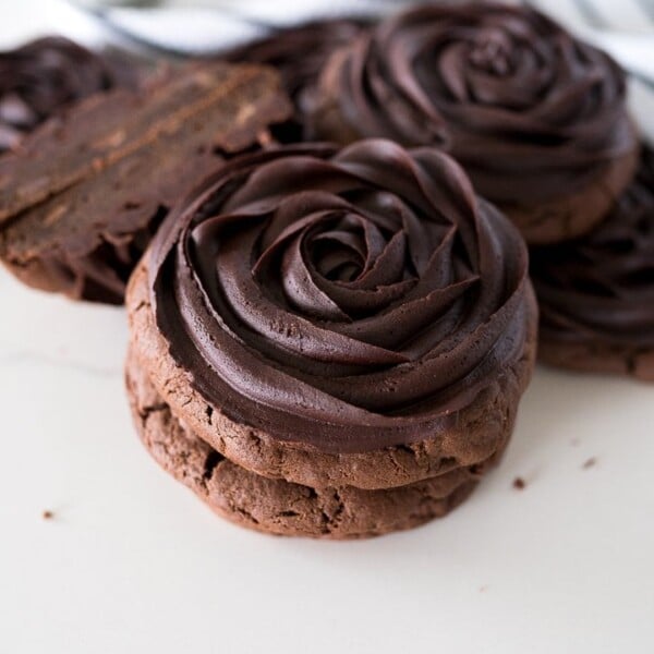 chocolate cookies with a rosette swirl of chocolate fudge frosting on top.