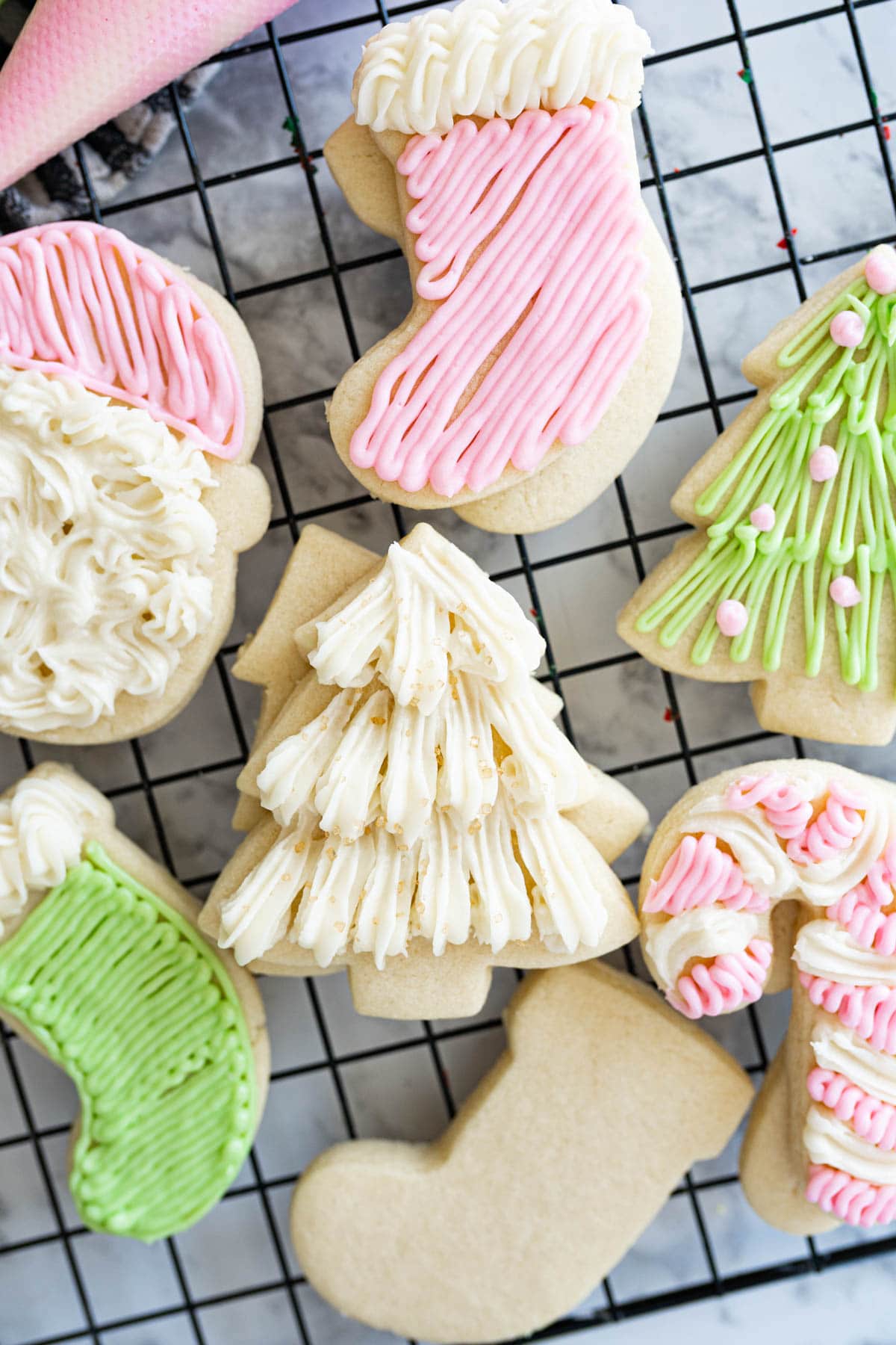 sugar cookies decorated with sugar cookie frosting to make Christmas Sugar Cookies