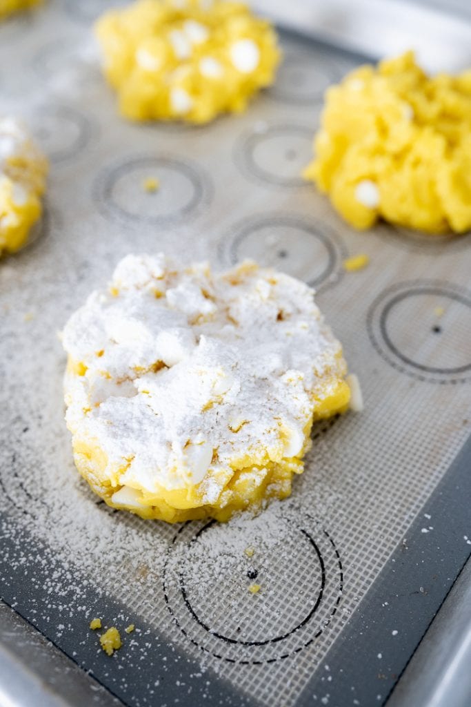 spooned powders sugar on top of the lemon cookie before baking.