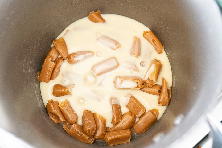 soft caramels and sweetened condensed milk in a pan