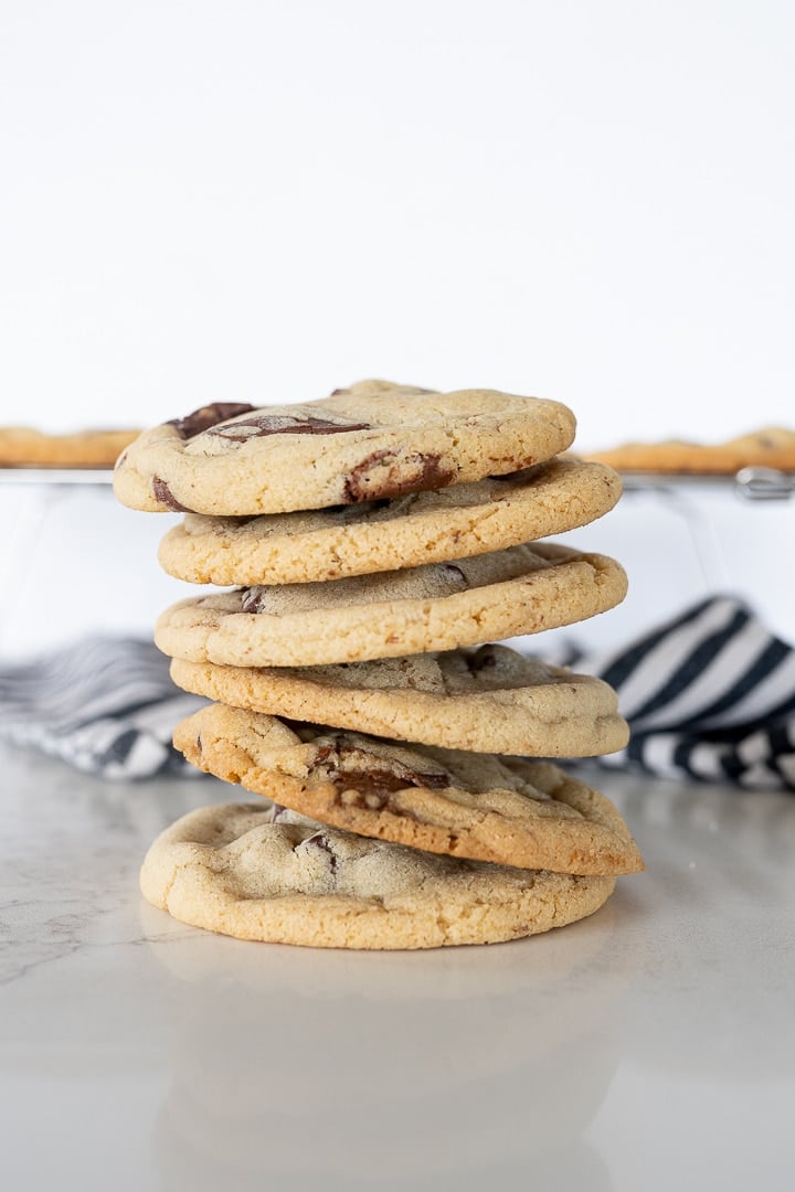 chocolate chip cookies stacked on top of each other