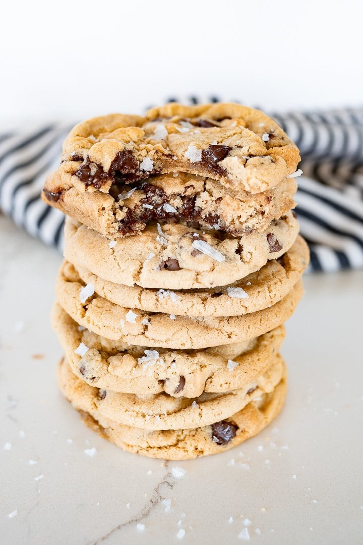 sea salt chocolate chip cookies stacked on top of each other
