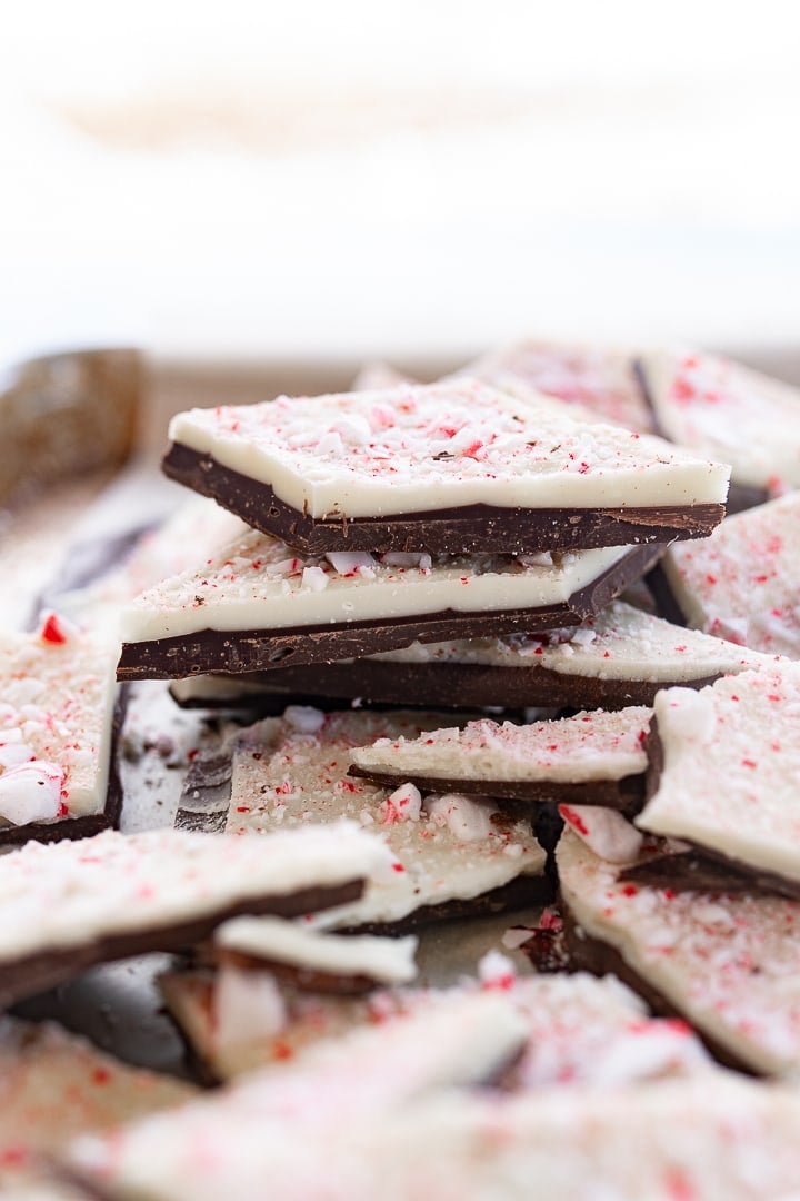 Peppermint bark stacked in a pile on the counter.