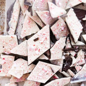 Peppermint bark pieces laying in a large pile on the counter.