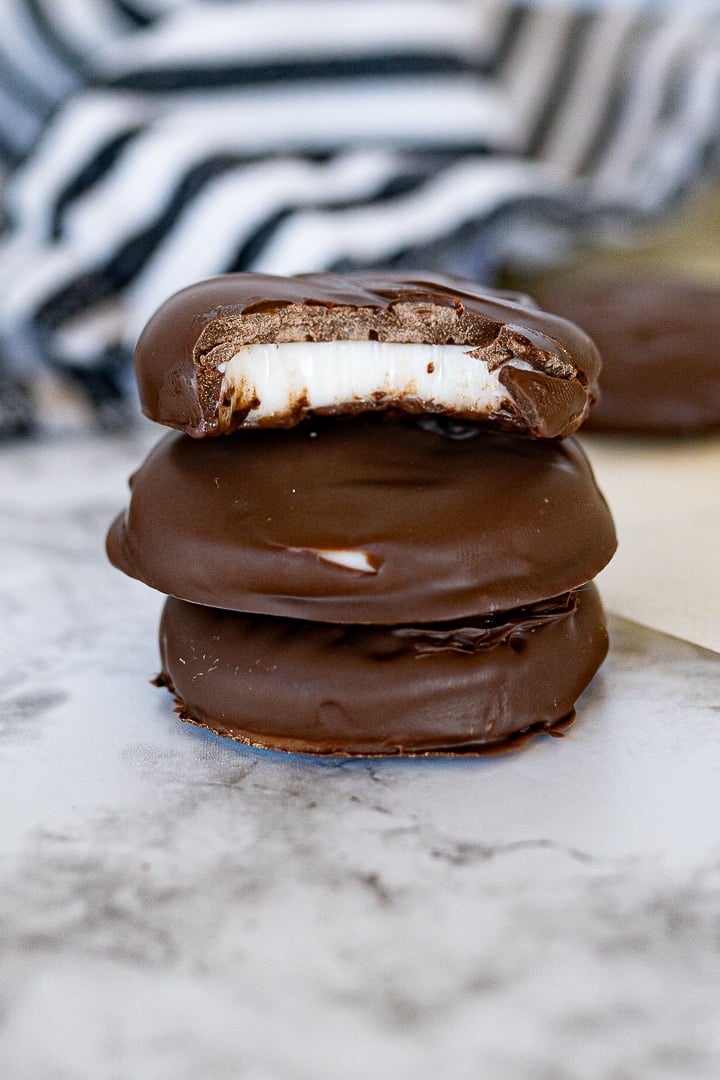 peppermint patties stacked on top of each other, on the counter.
