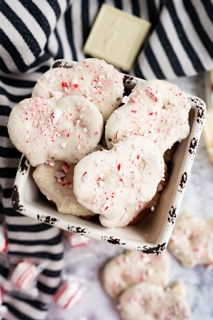 peppermint pretzels in a little ceramic box on the counter.