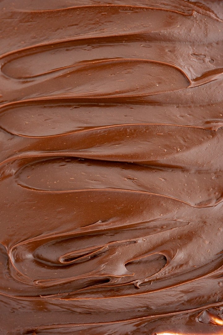 Chocolate fudge spread in a smooth layer.