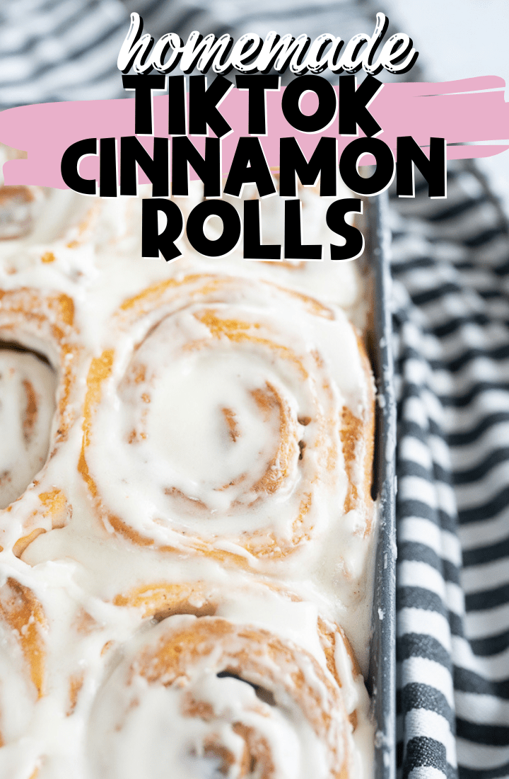 Cinnamon rolls in a pan with text overlay.