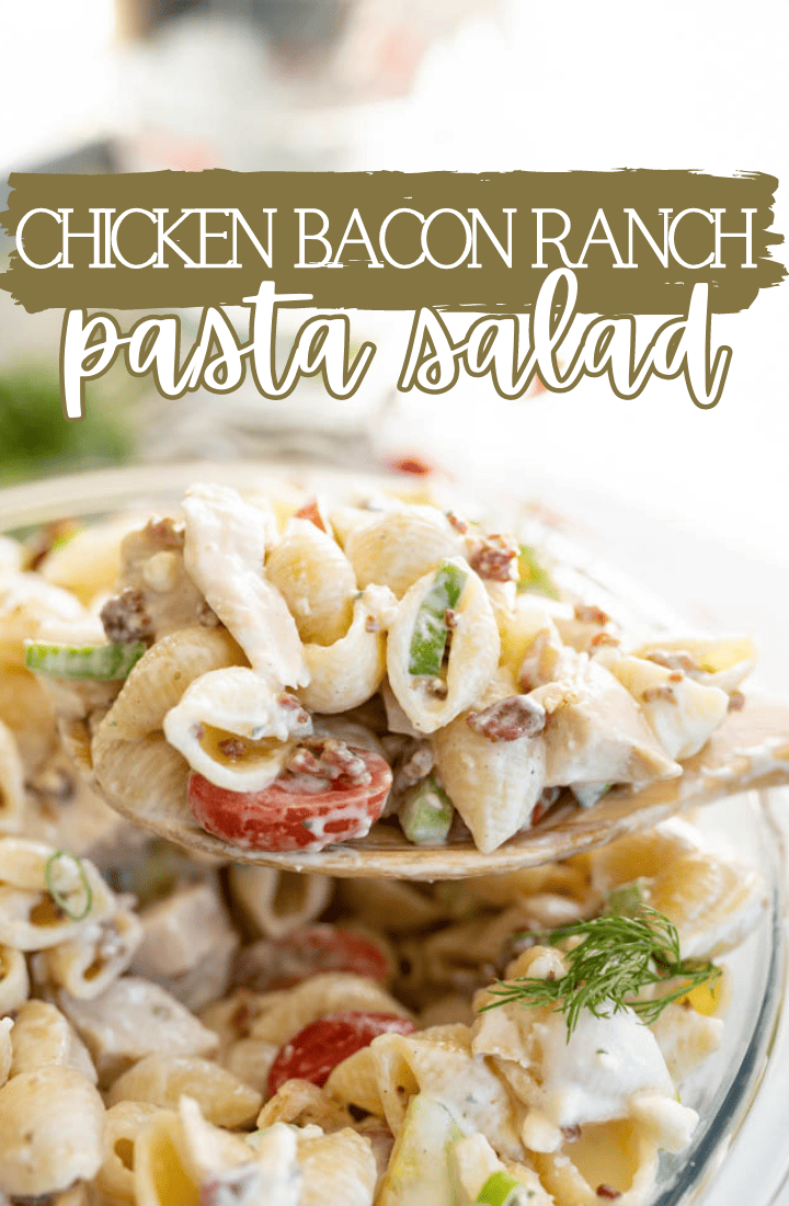 Bowl of chicken bacon ranch pasta salad with a wooden spoon scooping a serving out. Across the top it says "chicken bacon ranch pasta salad" in text. 