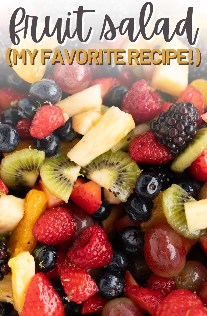 Close up of chopped fruit, across the top it says "fruit salad my favorite recipe"