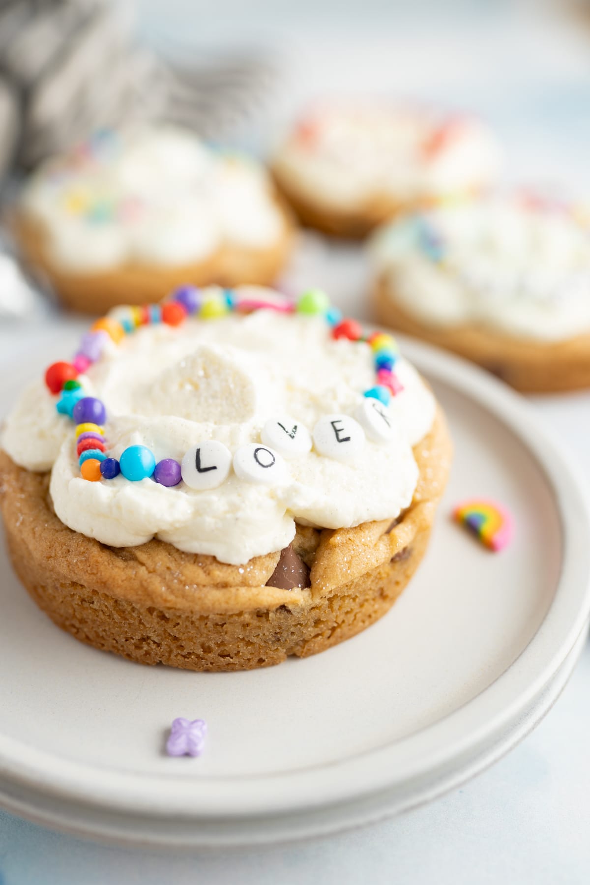 Close up of a lover themed caramel blondie Taylor Swift cookie. 