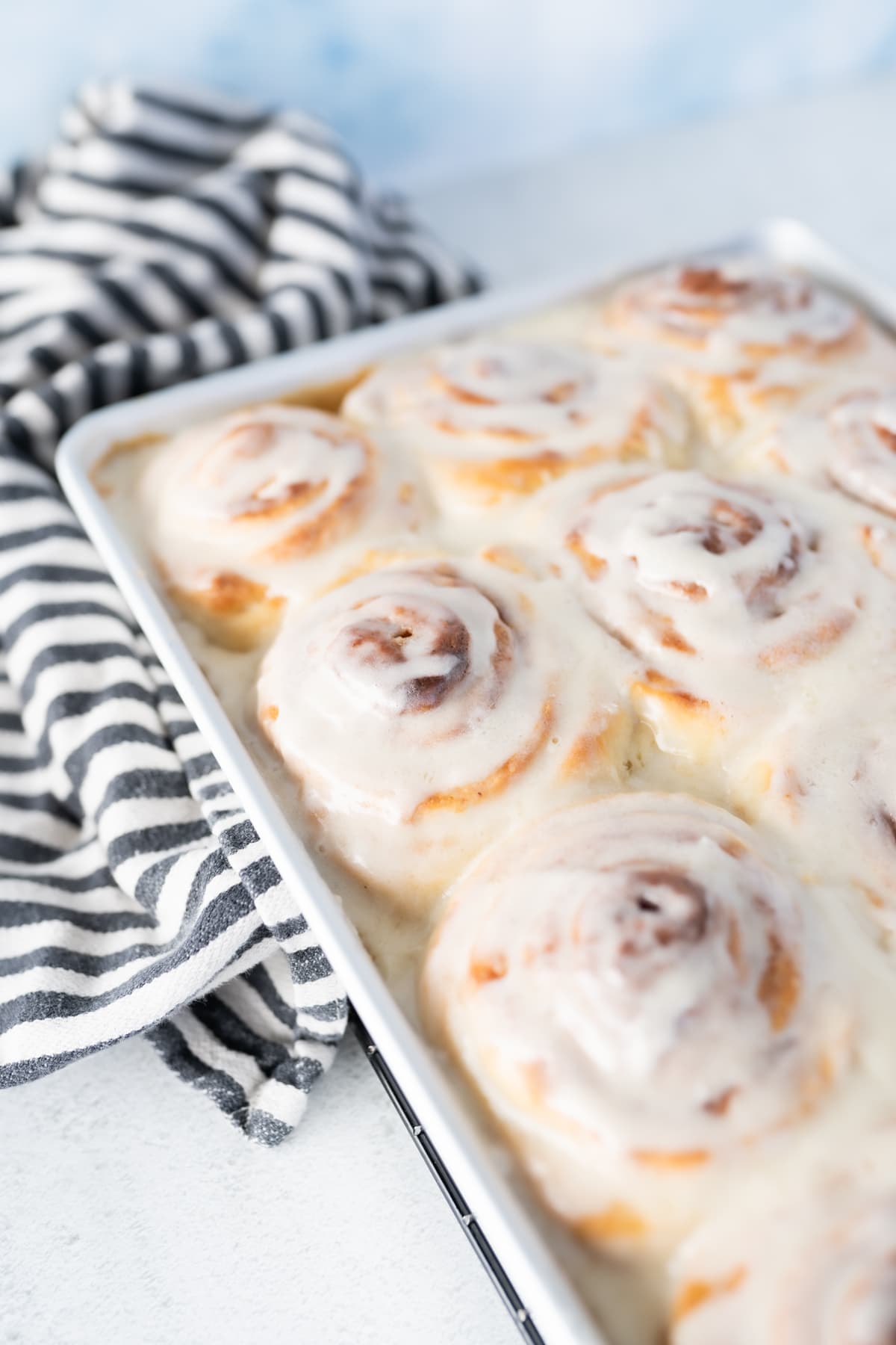 View of a pan of cinnamon rolls. 
