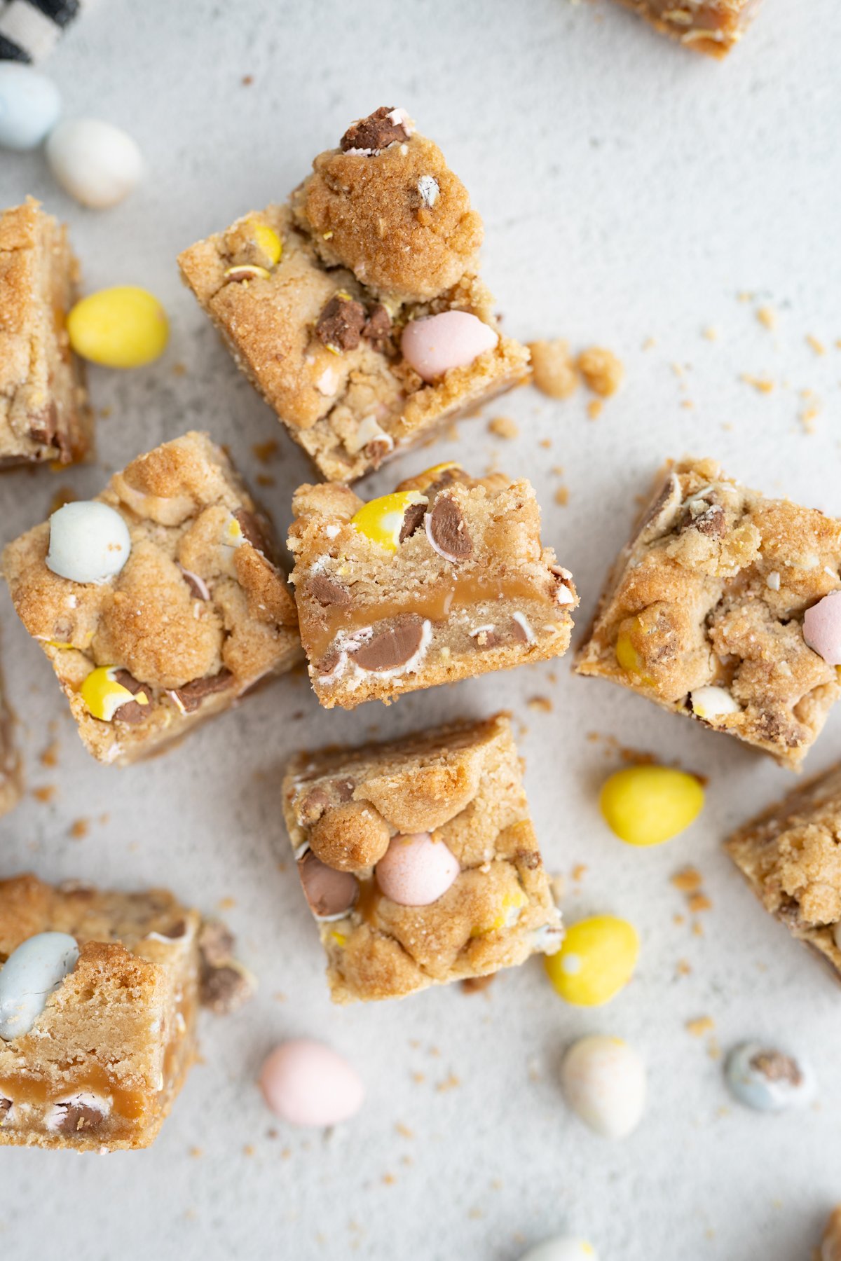 Aerial view of cadbury egg caramel cookie bars on the counter. 