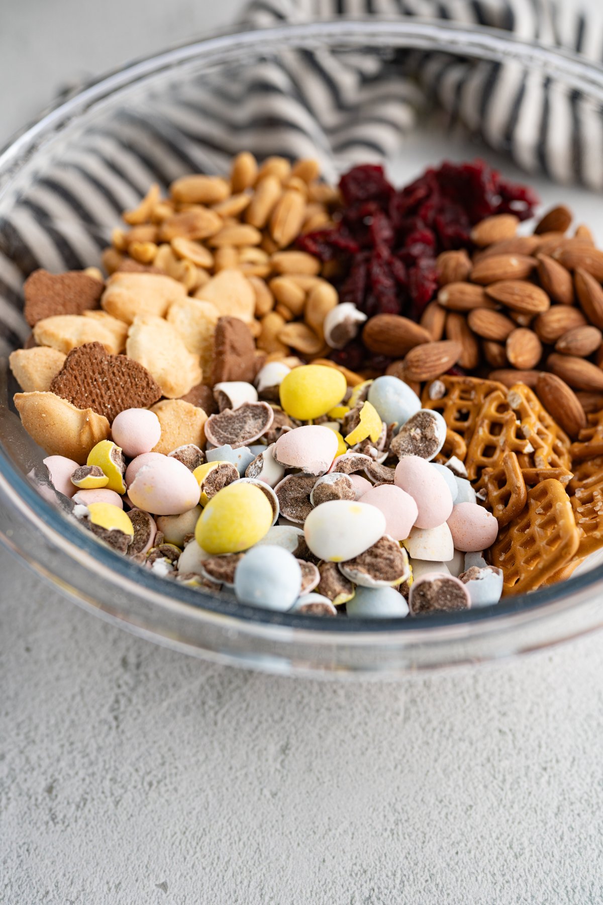 Serving bowl of cadbury egg trail mix before being mixed together. 