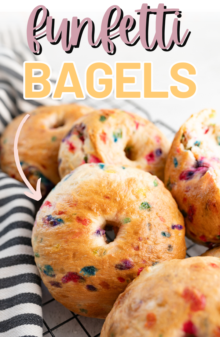 A pile of funfetti bagels on a wire cooling rack. Across the top it says "funfetti bagels"