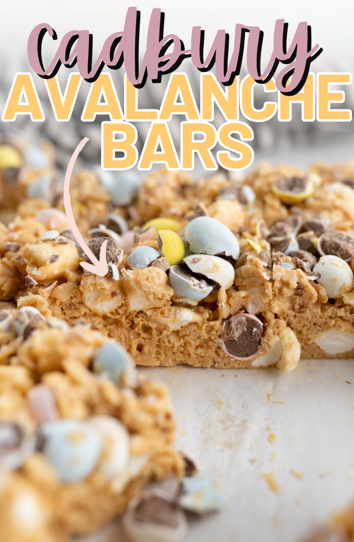 Side view of a pan of avalanche bars with cadbury mini eggs on top. Across the top it says "Cadbury Avalanche bars" in text.