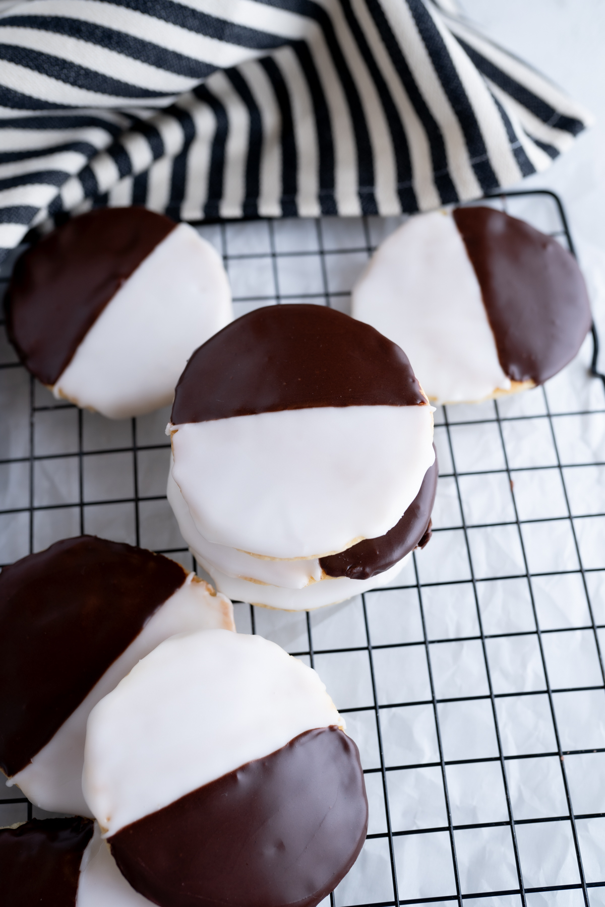 A New York Black and White cookie stacked on top of another. 