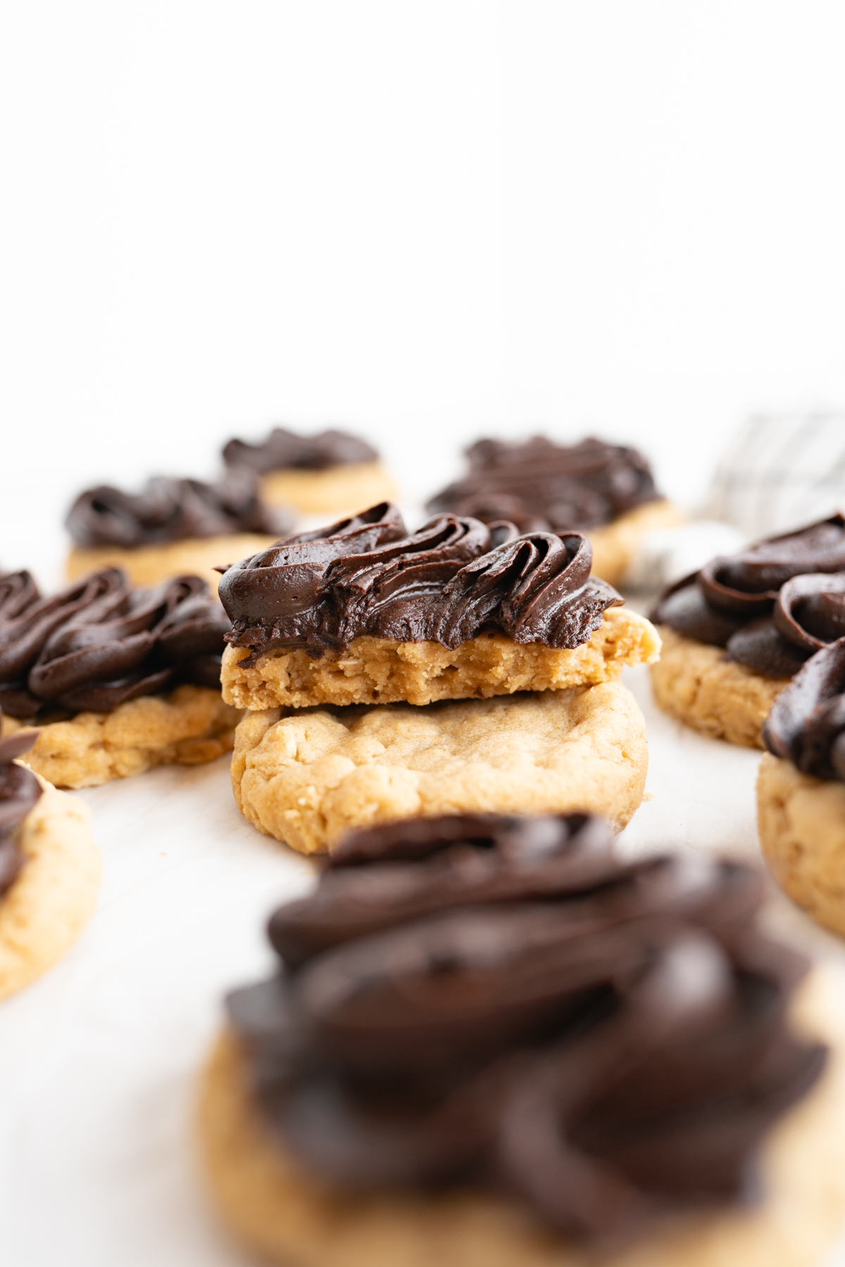 A peanut butter bar cookie stacked on top of another one.