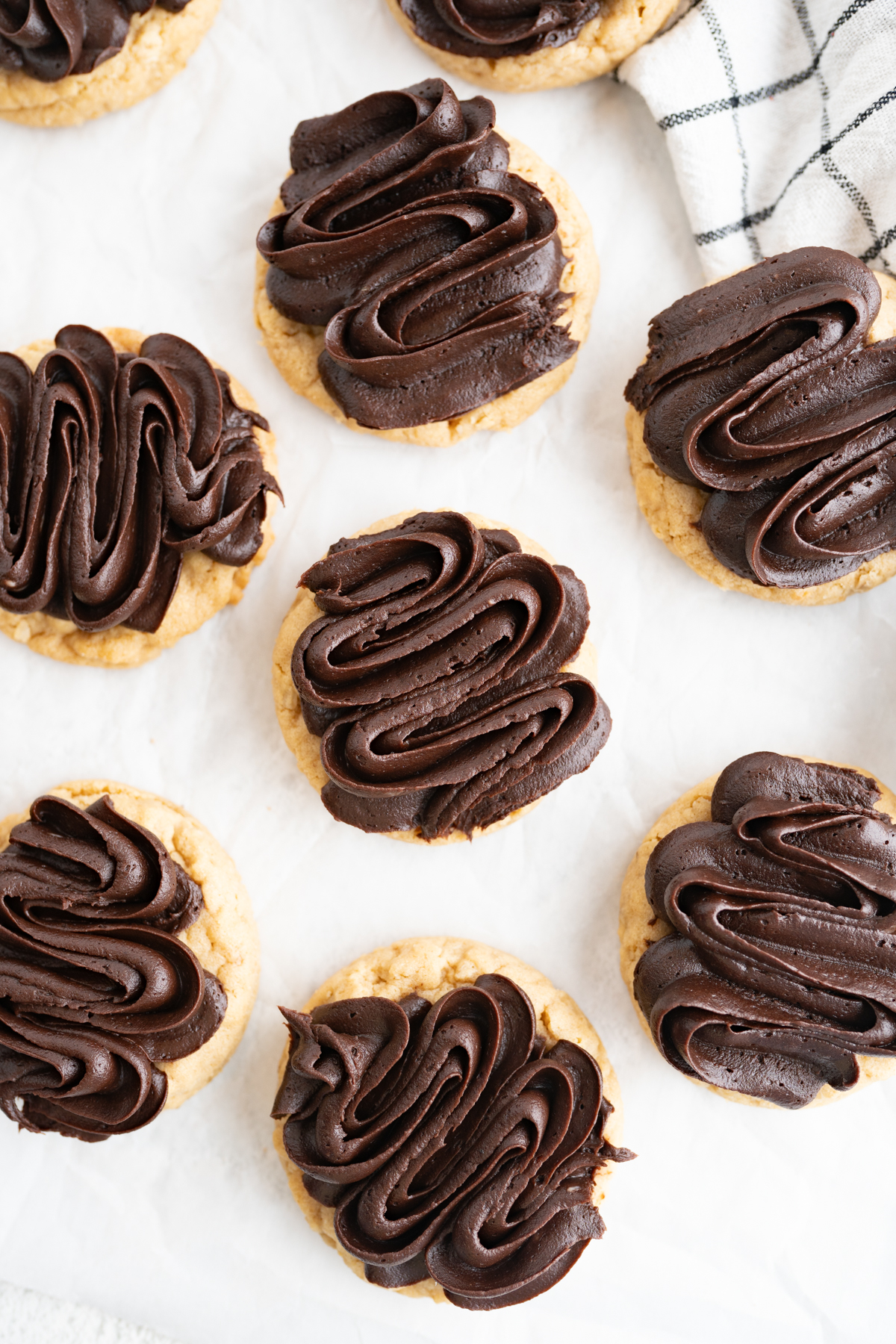 Aerial view of peanut butter bar cookies spread out on the counter.