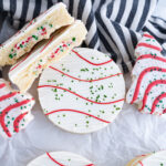 A sugar cookie stuffed with christmas tree cake buttercream. Christmas cookie inspired by Little Debbie.