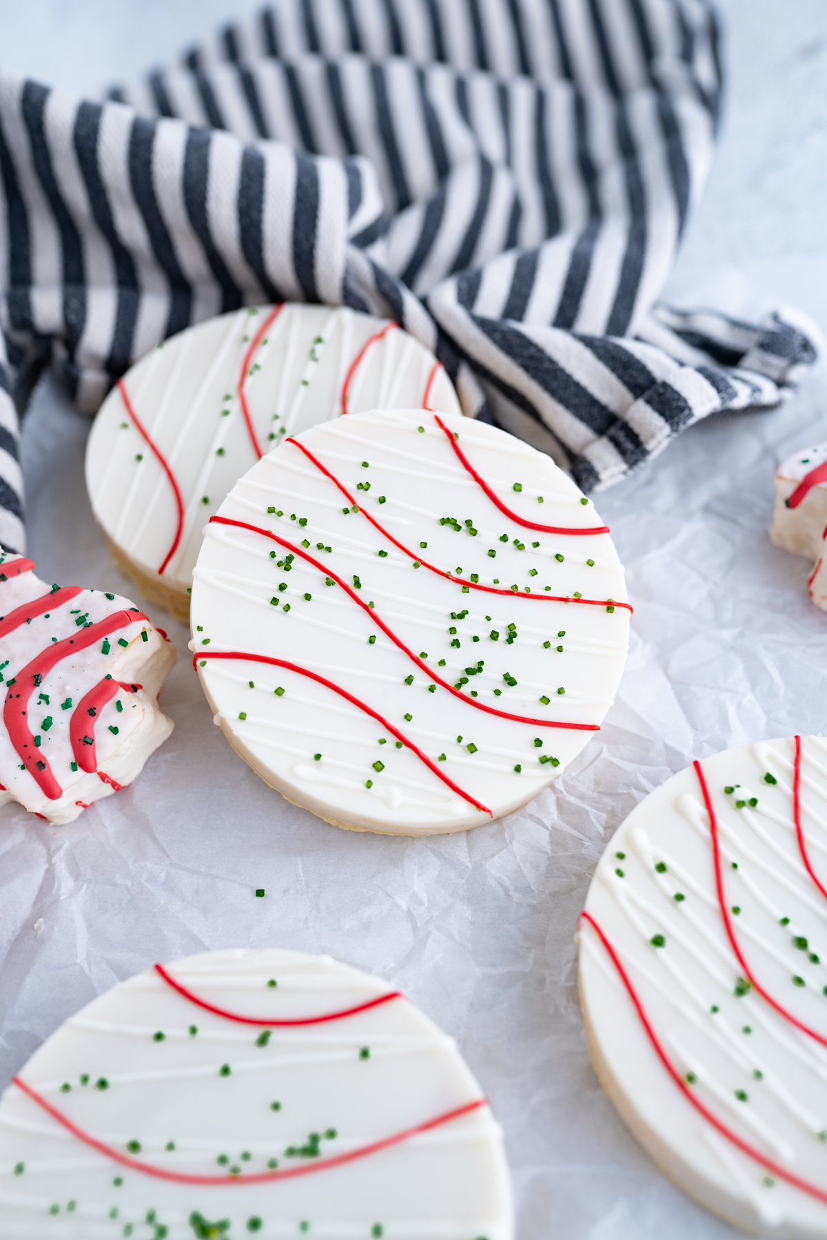 Aerial view of sugar cookies stuffed with christmas tree cake buttercream.