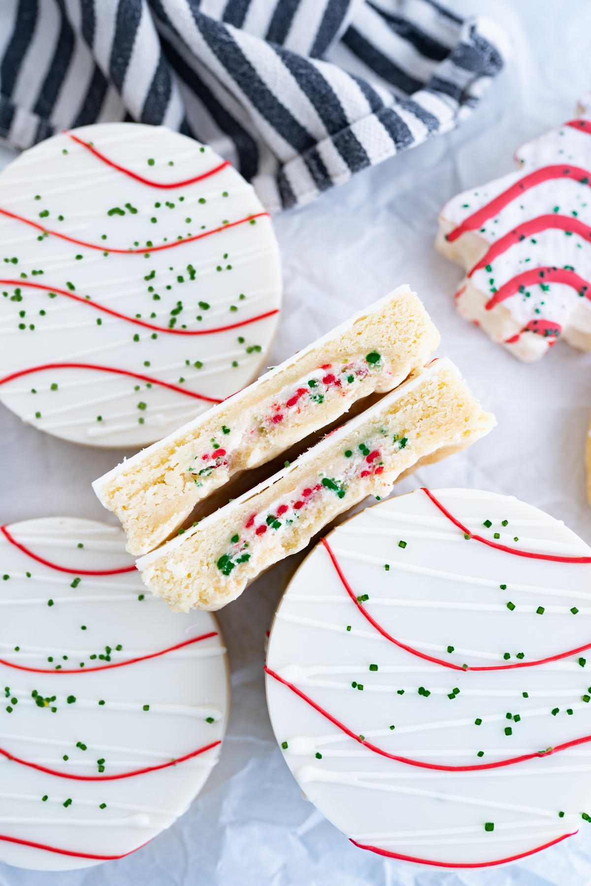 A Christmas Tree Cake inspired cookie filed with buttercream.