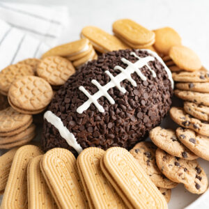 A chocolate cheeseball shaped and decorated like a football for the Super Bowl.