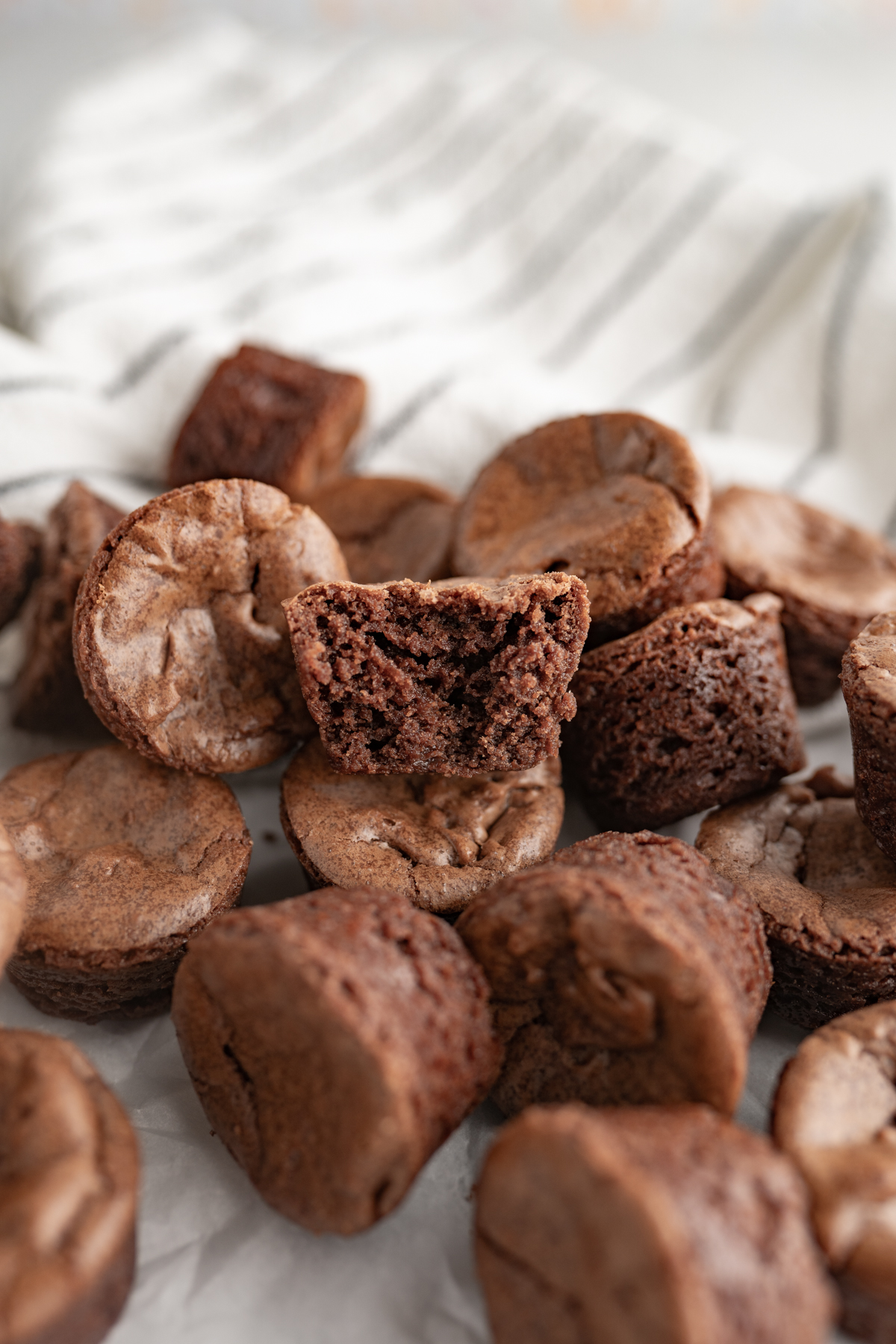 Close up of a brownie bite split in half.