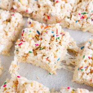 A cake batter rice krispie treat filled with sprinkles.