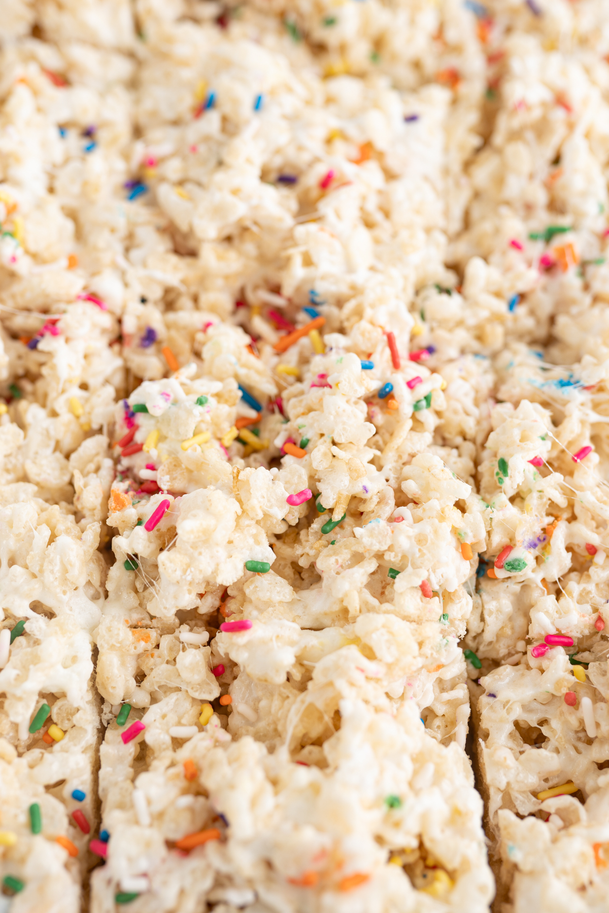 A rice krispie treat with sprinkles and cake batter flavoring. 