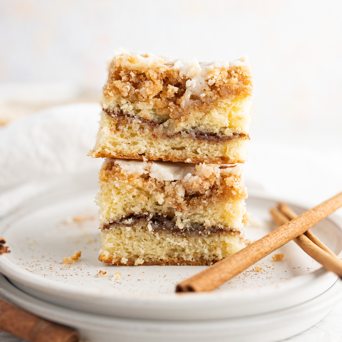 A stack of 2 slices of moist coffee cake.