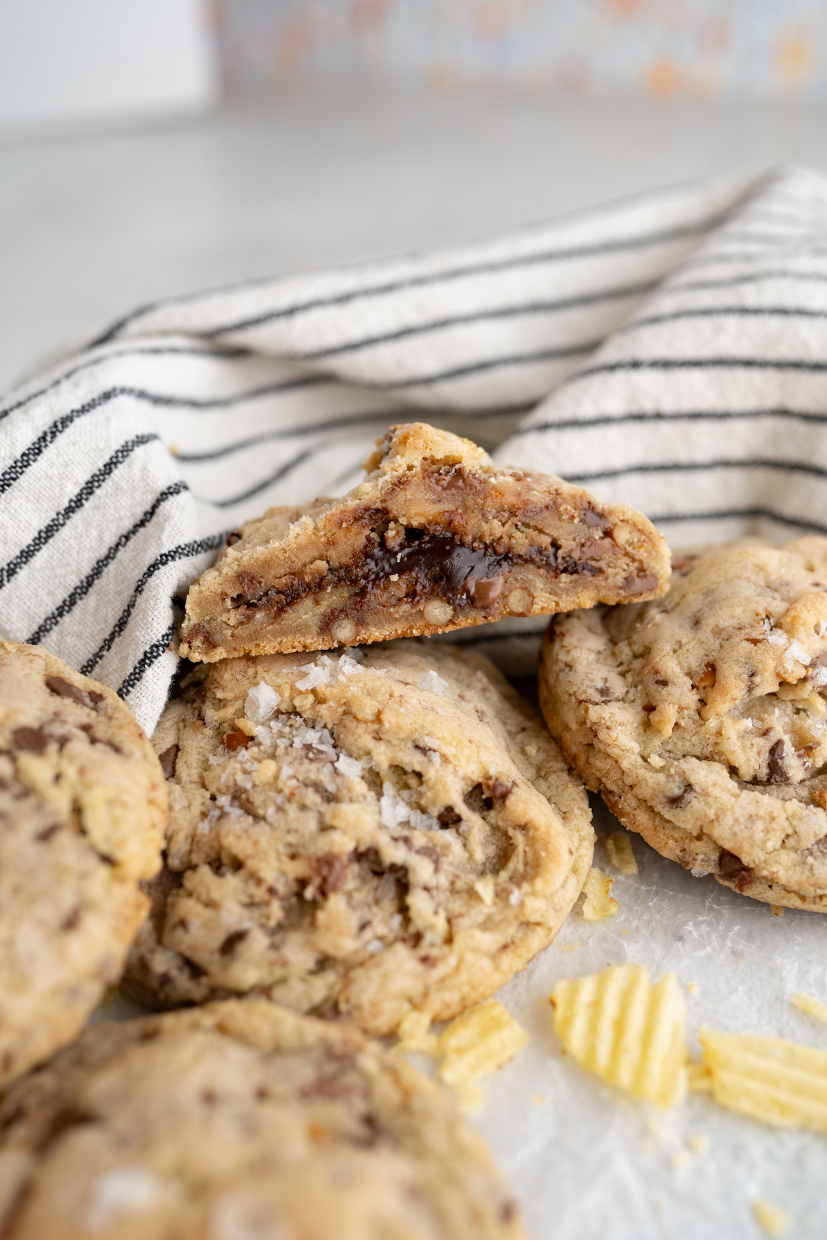 A kitchen sink style cookie filled with hot fudge.