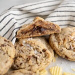 A sweet and salty trash cookie filled with hot fudge.