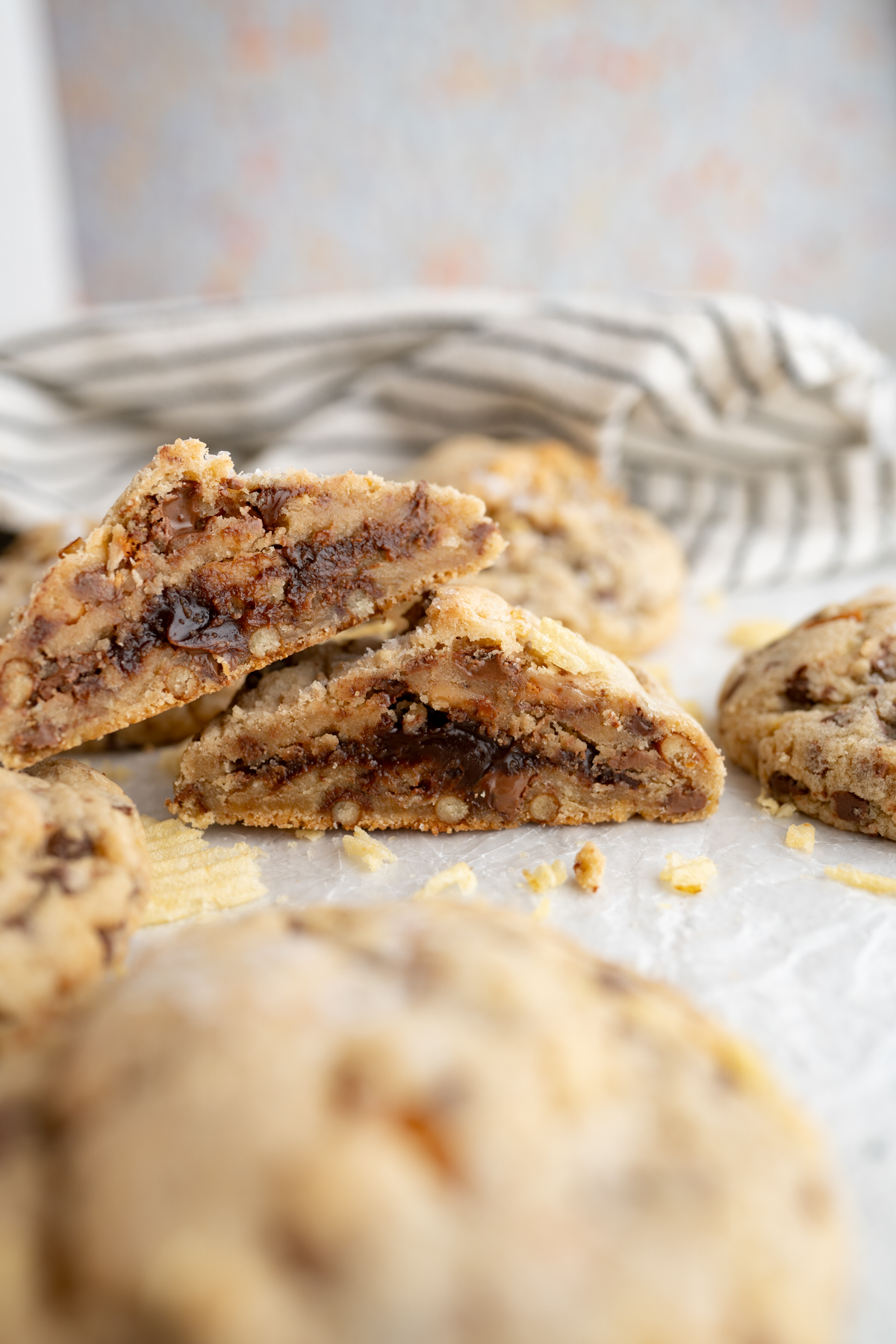 A kitchen sink style cookie cut open to reveal a hot fudge center. 