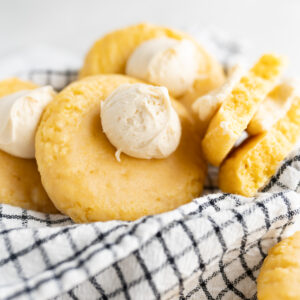 A basket of large Crumbl cornbread cookies made at home.