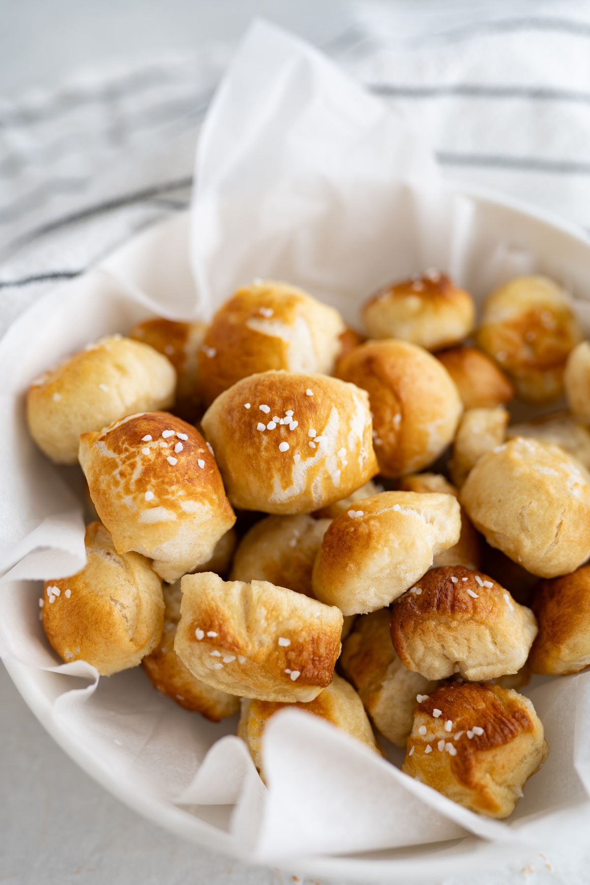 Aerial view of a bowl of homemade soft pretzel bites.
