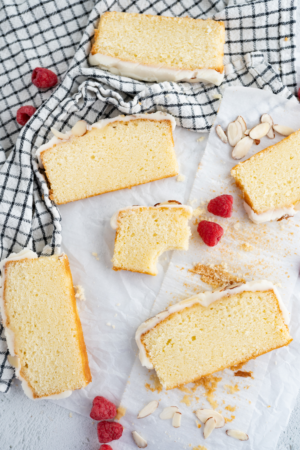 Aerial view of almond pound cake slices on a counter. 