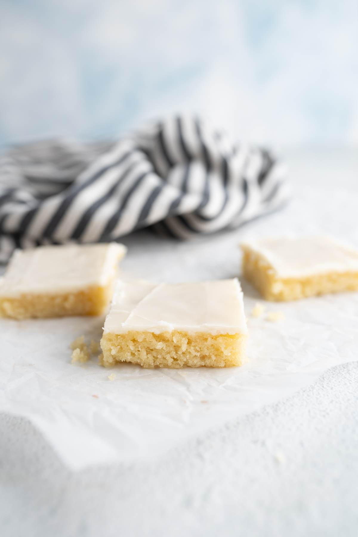 side view of vanilla sheet cake. 