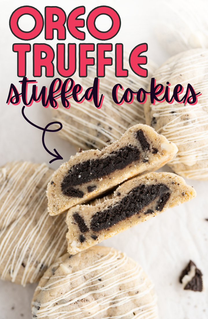 Oreo truffle stuffed cookies cut in half to reveal the filling.